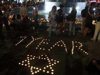 People gather to mark the first anniversary of the October 7 attacks in Tel Aviv on October 7, 2024. (Gil Cohen-Magen/AFP via Getty Images)