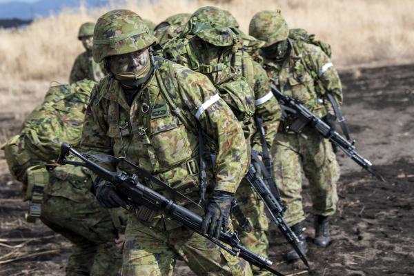 Japan Ground Self-Defense Force paratroopers assigned to the 1st Airborne Brigade move to follow-on locations after landing at JGSDF East Fuji Maneuver Area, Japan, Jan. 31, 2023, (U.S. Air Force photo by Yasuo Osakabe)