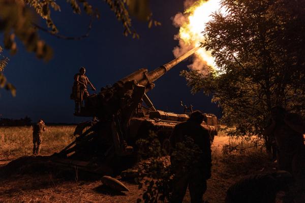 Ukrainian soldiers fire an artillery piece at their combat position in Donetsk Oblast, Ukraine, on July 26, 2024. (Photo by Diego Herrera Carcedo/Anadolu via Getty Images)