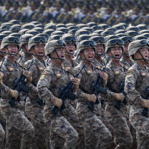 Chinese soldiers shout as they march during a military parade in Tiananmen Square on September 3, 2025, in Beijing, China. (Getty Images) Share to Twitter