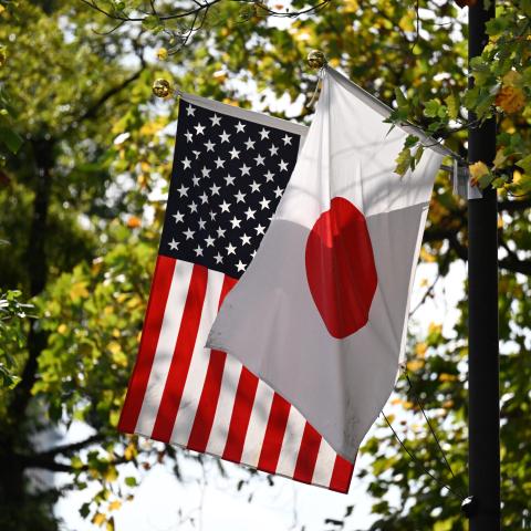 The Japanese and US flags fly outside the Akasaka Palace in Tokyo on October 28, 2025. (Getty Images)